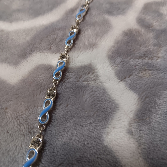 Blue enamel and crystal infinity bracelet. - Picture 4 of 14
